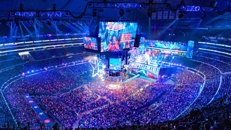 Wide-angle view of packed stadium at WWE WrestleMania