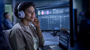 Engineer monitoring network observability dashboard